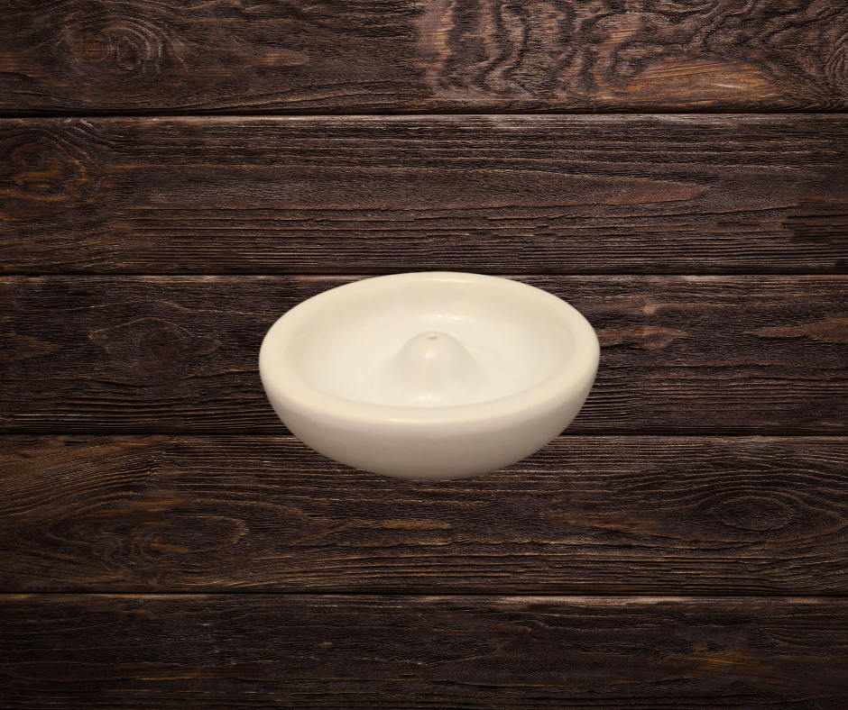 white ceramic incense holder